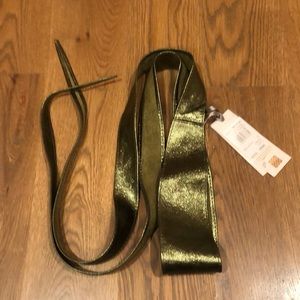 Metallic green tie belt.